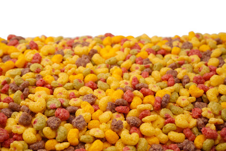 Sweet crunchy cornflakes as background. Top view.