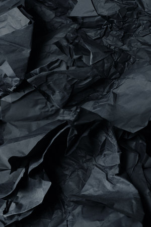 Abstract black paper texture background. Top view. Copy space.の写真素材