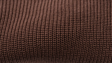 Brown sweater texture as a background. Top view.の写真素材