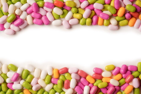 Sweet multicolored candies isolated on a white background.の写真素材