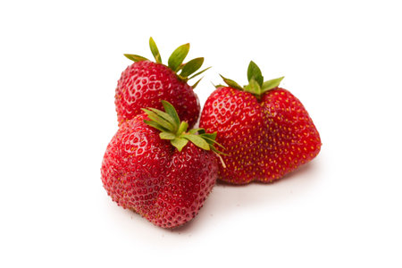 Strawberry. Fresh group of berries isolated on a white background.の写真素材