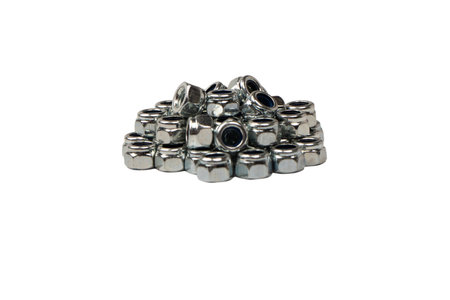 A group of metal nuts isolated on a white background. Top view.の写真素材