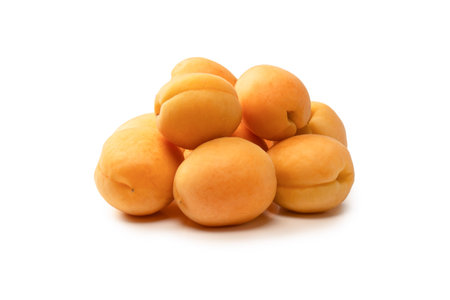 Ripe juicy orange apricots isolated on a white background.の写真素材