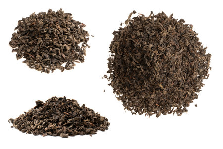 Dried tea leaves isolated on a white background. top view.の写真素材
