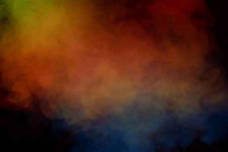 Blue and yellow steam on a black background. copyspace.の写真素材