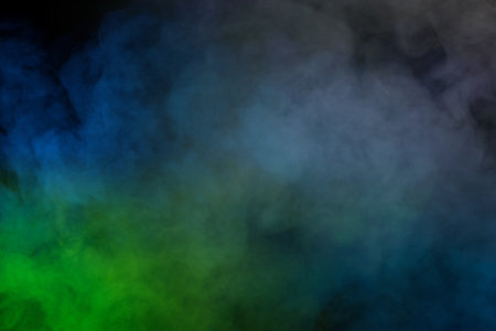 Green and white steam on a black background. copyspace.の写真素材