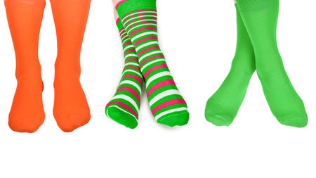 Orange socks on woman foot isolated on white background.の写真素材