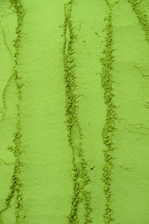 Matcha tea, matcha powder as a background.