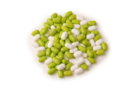 Sweet multicolored candies isolated on a white background.の写真素材