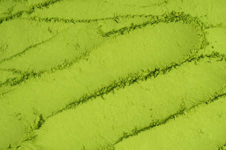 Matcha tea, matcha powder as a background.