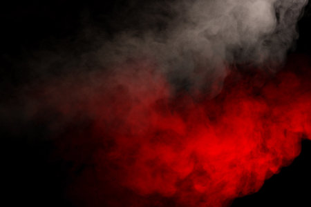 Purple and blue steam on a black background. Copy space.の写真素材