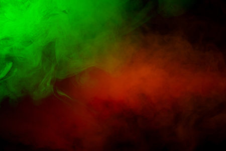 Green steam on a black background. Copy space.の写真素材