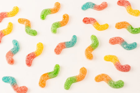Juicy colorful jelly sweets isolated on a white background. Gummy candies. Snakes.の写真素材