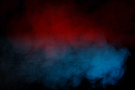 Blue and yellow steam on a black background.の写真素材