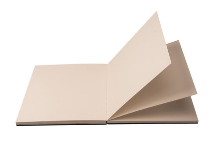 Open notebook with blank pages isolated on a white background. Top view.の写真素材