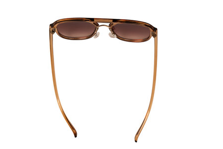 Woman brown trendy sunglasses isolated on a white background.の写真素材