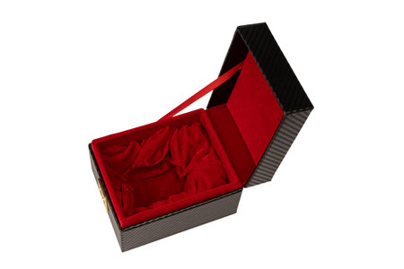 Black empty box covered with red velvet isolated on a white background.の写真素材