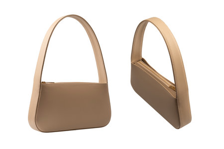Beige women leather bag isolated on a white background.の写真素材