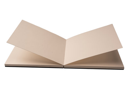 Open notebook with blank pages isolated on a white background. Top view.の写真素材