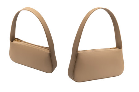 Beige women leather bag isolated on a white background.の写真素材