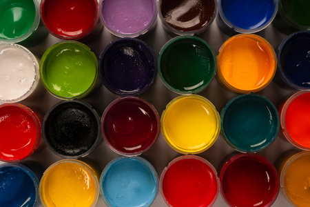 Gouache colorful paints set. Jars of gouache paint isolated on a white background.の写真素材