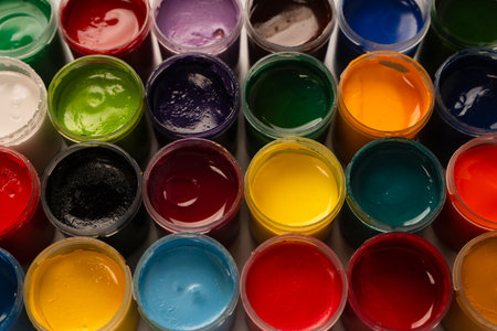 Gouache colorful paints set. Jars of gouache paint isolated on a white background.の写真素材