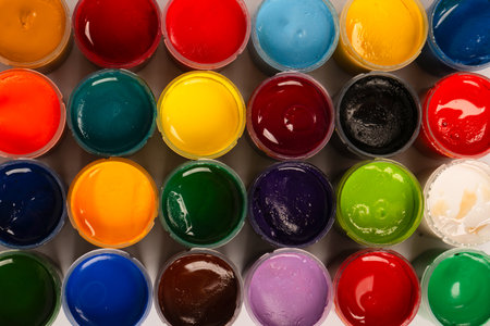 Gouache colorful paints set. Jars of gouache paint isolated on a white background.の写真素材
