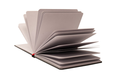 Open notebook with blank pages isolated on a white background. Top view.の写真素材