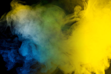 Green steam on a black background. Copy space.の写真素材