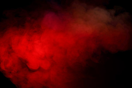 Orange and red steam on a black background.