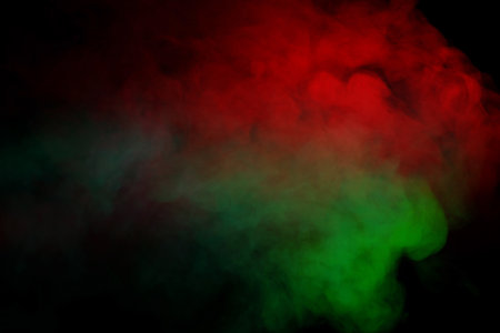Blue and green steam on a black background.の写真素材