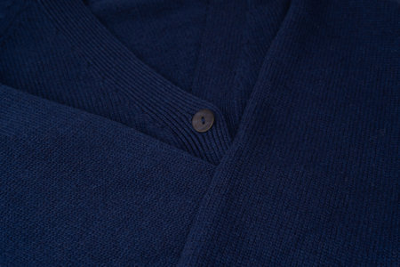 Navy blue merino wool cardigan texture as background. Top view.の写真素材