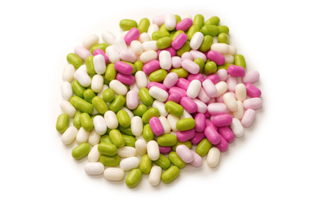 Sweet multicolored candies isolated on a white background.の写真素材