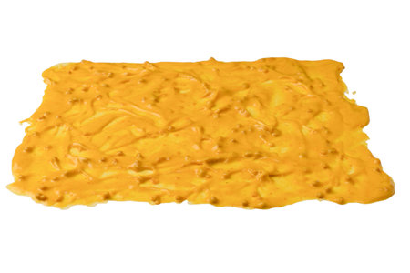 Yellow sauce splashes as a background.の写真素材