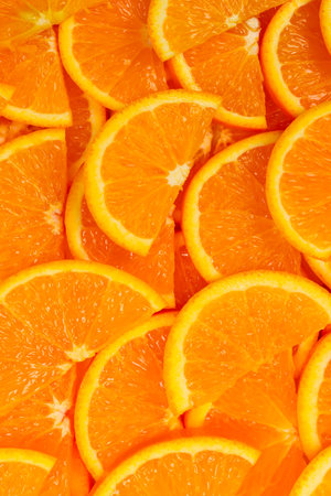 Slices of oranges as a background, top view.の写真素材