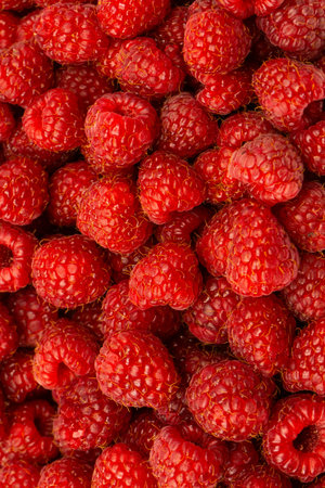 Tasty fresh raspberry as a background. Top view.
