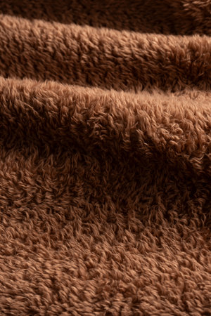 Texture of a brown faux fur as a background.