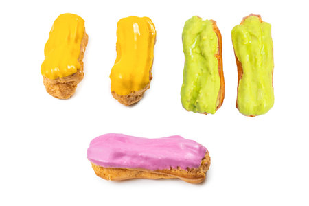 Fresh tasty eclairs isoalted on white background. Top view.