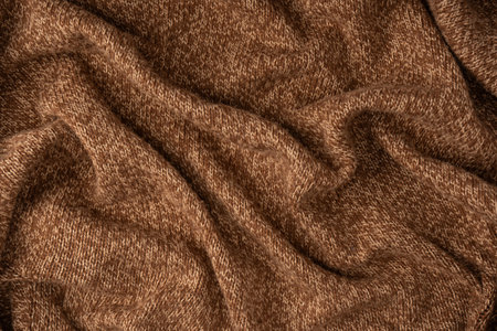Soft brown merino wool sweater texture as a background. Top view.の写真素材