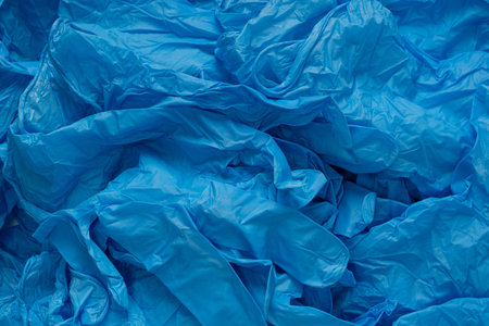 Pink and blue latex sterile medical gloves as a background.