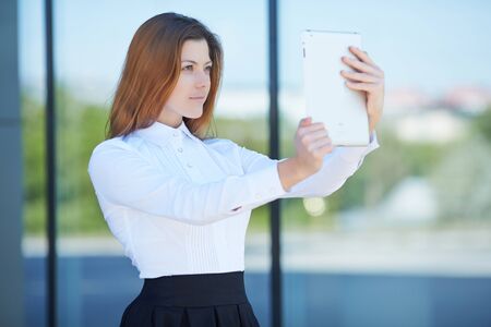 girl with the tabletの写真素材