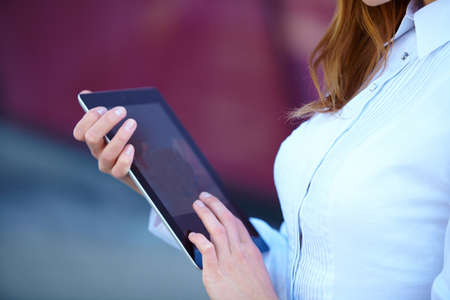 girl with the tabletの写真素材