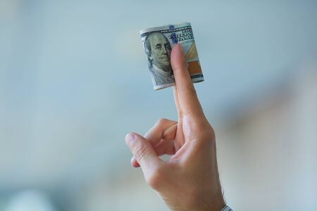 Businessman holding money in his handsの写真素材