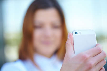 girl with the phoneの写真素材