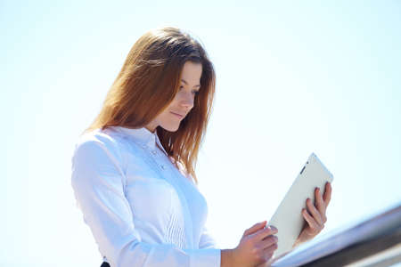 girl with the tabletの写真素材