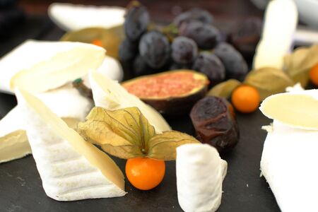 set of ingredients: cheese, olives, berries, sauces, snacksの写真素材