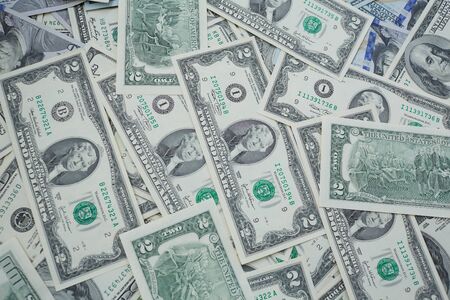 banknotes to two and one hundred USDの写真素材