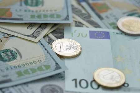 dollars and euro coinsの写真素材