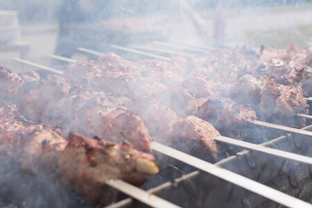 skewers frying on skewers