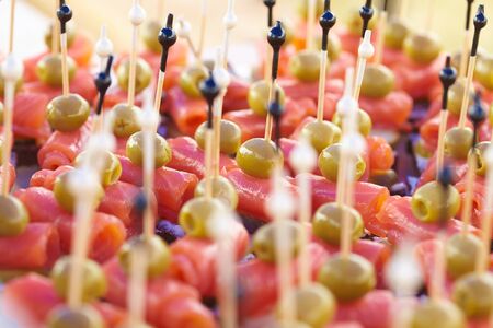 appetizer on skewers with red fishの写真素材